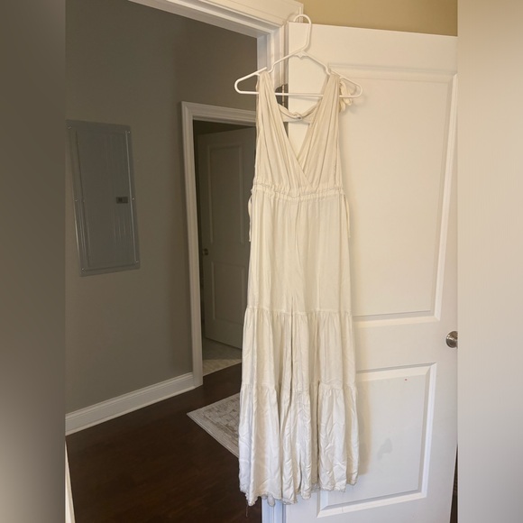 Free people movement flowy cream colored jumpsuit with ties - Picture 1 of 3